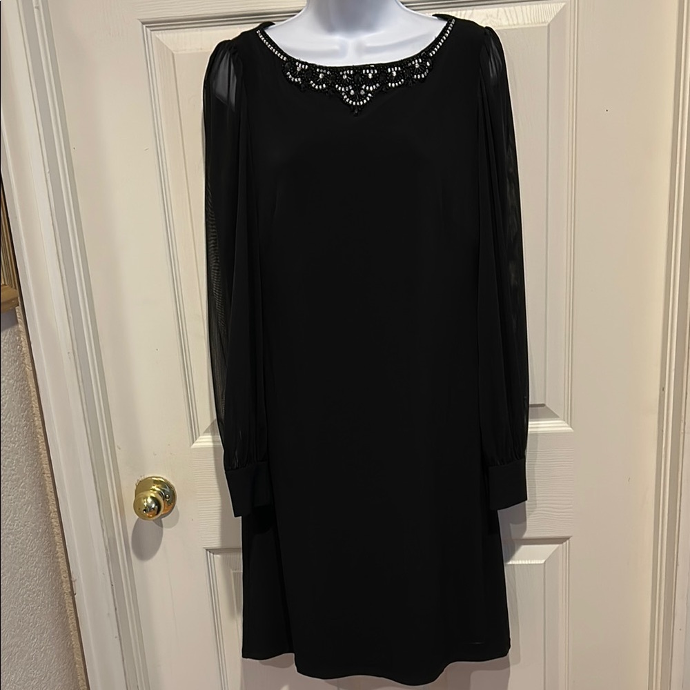 Elegant Black Dress with Beaded Neckline